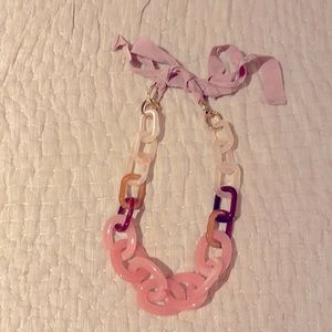 Beautiful acetate oversized necklace with ribbon tie trim